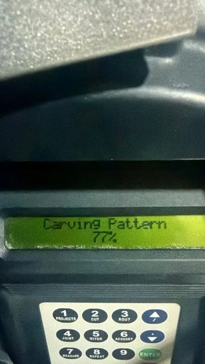 CNC display showing carving pattern at 77 percent