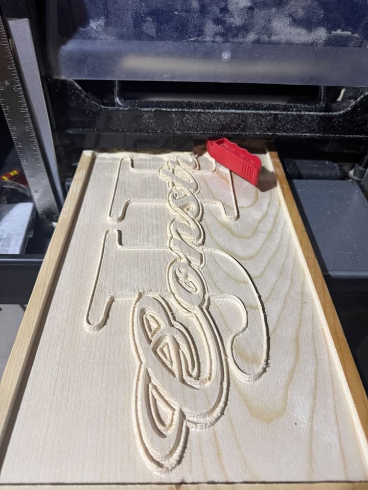 Custom CNC carving in progress on the machine